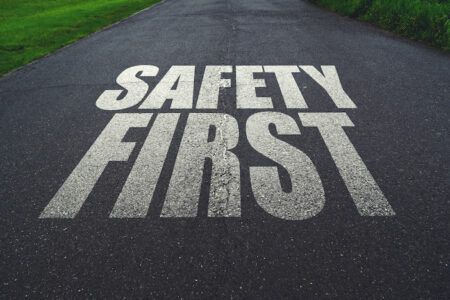 Safety first, message on the road. Concept of safe driving and preventing traffic accident.