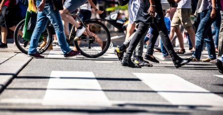 People on pedestrian crossings, on foot and by bicycle