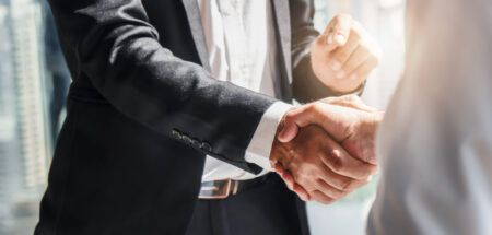 business background of businessman having handshake