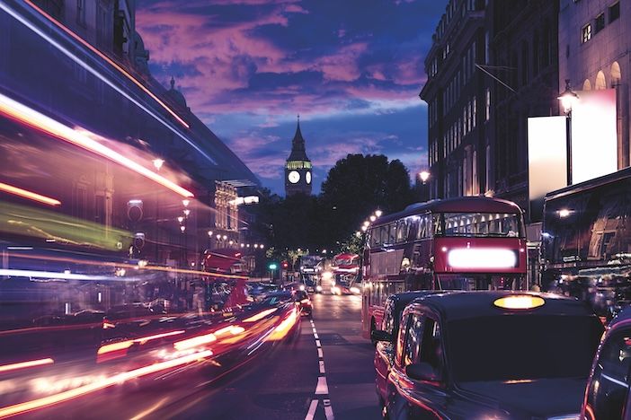 London Big Ben from Trafalgar Square traffic lights at sunset. 