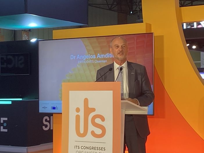 Man at podium at event