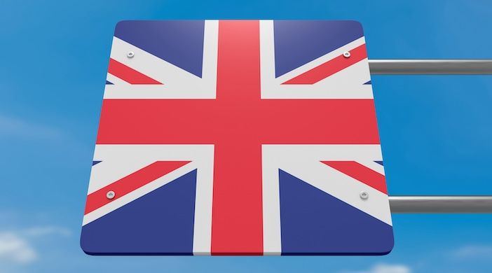 UK Union Jack Flag Road Sign Against A Cloudy Sky, 3d illustration