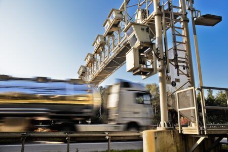 truck passing toll gantry