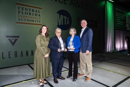 New York’s congestion charging wins IBTTA President’s Award for MTA B&T Three woman and a man in business attire. Two women in the center hold awards