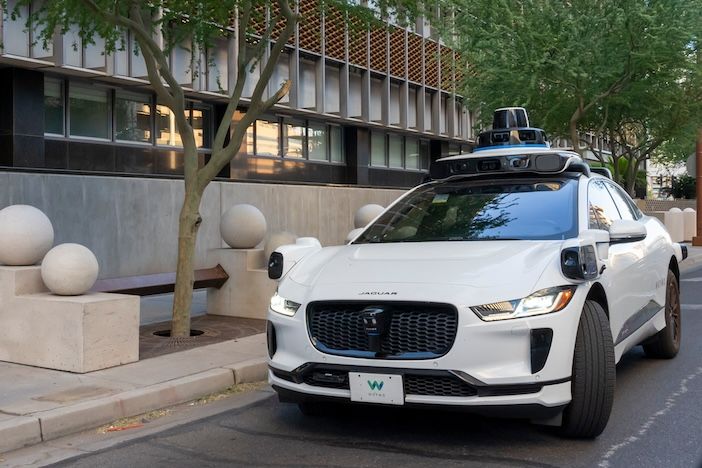 A Waymo’s self-driving Jaguar electric car on the road. Phoenix, Arizona, USA.