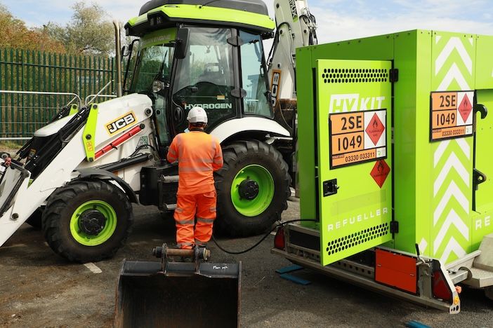 Worlds first hydrogen powered excavator developed by global manufacturer JCB being refuelled with hydrogen fuel provided by hydrogen supplier, Ryze