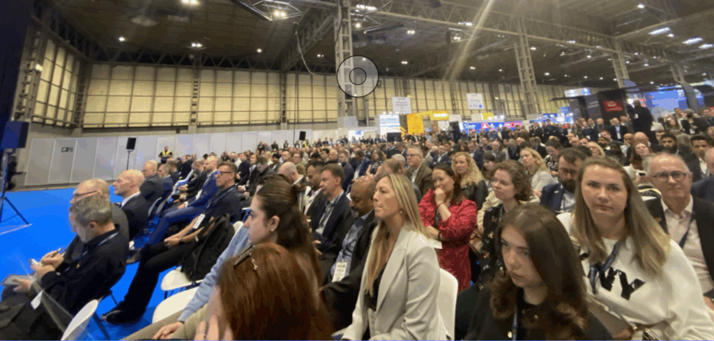 An audience in a large hall