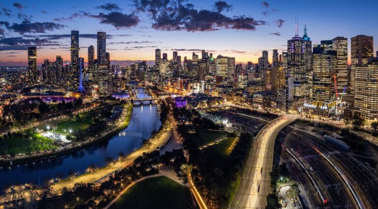 TomTom and Aimsun join forces for transport planning Aerial panorama of the beautiful city of Melbourne at dusk
