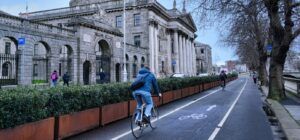 Dublin has a lot of cyclists, who make use of a large network of bike lanes, such as this one beside the River Liffey in front of the Four Courts
