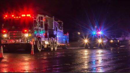 First Responders - firefighters and police officers - on a wet night