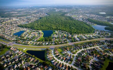 Florida county tackles Disney-area traffic with real-time work zone platform Drone view of urban area with roads and large park areas