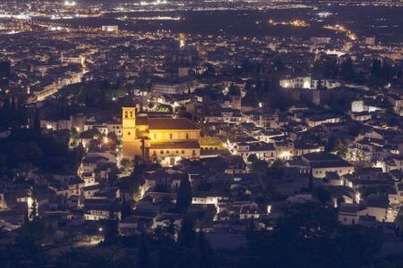 New AI edge-computing pilot for traffic priority in Granada, Spain Panorama of Granada at night - aerial view. Granada, Andalusia, Spain.