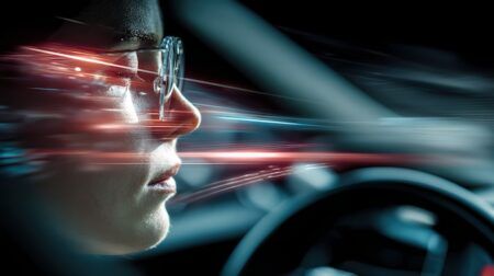 Driver's tired face illuminated by dashboard warning light and activated fatigue detection system inside car, emphasizing automotive safety technology and real time driver alertness monitoring.