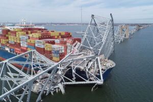 The Francis Scott Key Bridge being struck by a container ship