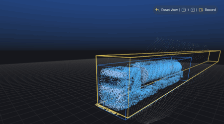 INTERTRAFFIC: Blickfeld to demo lidar traffic management solutions A 3D LiDAR point cloud visualisation of a large vehicle, rendered in blue against a dark grid background, enclosed within a yellow bounding box with a tracking label, as displayed in Blickfeld's perception software interface.