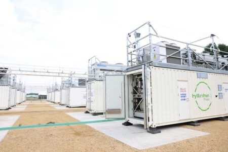 GeoPura wins record green hydrogen deal for Lower Thames Crossing Rows of white containerised electrolysis units at GeoPura's HyMarnham Power facility in Nottinghamshire, with green branding visible on the nearest unit. Caption: GeoPura's HyMarnham Power facility in Nottinghamshire, built on the site of a former coal-fired power station, is due to reach commercial operation in early 2026.