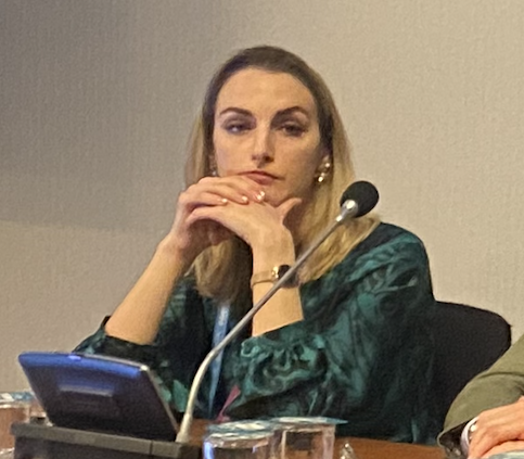 Woman in conference session with blonde hair