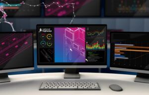 Computer monitors displaying data dashboards, structural diagrams and a National Highways-branded digital twin interface.