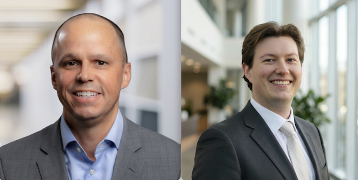 Two side-by-side corporate headshots. On the left, Zachary Radford, a man with a shaved head, smiling in a grey blazer over a blue button-down shirt, against a blurred corridor background. On the right, Dante DeSanctis, a man with brown hair, smiling in a dark suit and tie, standing in a bright, glass-walled office lobby.