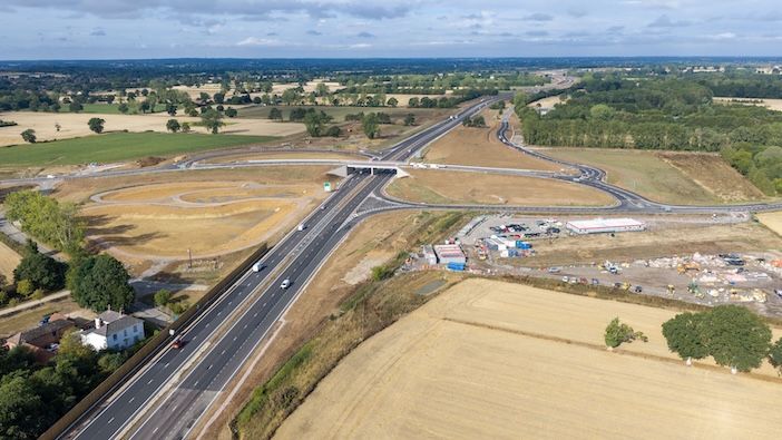 A47 Norfolk, England, dualling scheme reaches final stages Aerial view of the new A47 dual carriageway and junction near Blofield, Norfolk, showing the completed road running through surrounding farmland