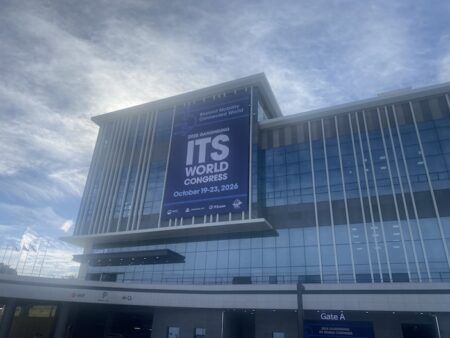 ITSWC KOREA: Opening Ceremony told safety outranks AI Large banner for the 2026 Gangneung ITS World Congress, 19-23 October, hanging on the glass façade of the venue building above Gate A.