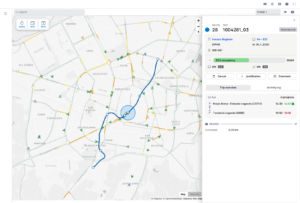 Screenshot of a street map with a blue route line and a highlighted vehicle position, alongside a side panel showing route 28 trip details, a 50% occupancy bar and scheduled and actual stop times