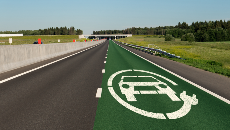 In-motion wireless charging could ease EV bottlenecks Road with lane for wireless charging of electric vehicles